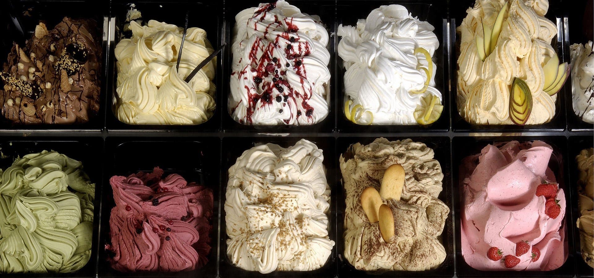 Inlet Ice Cream display case with rows of hand-dipped flavors